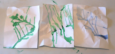 A picture of three finished water cycle paintings
