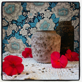 ByHaafner, vase, thrifted, blue wallpaper with flowers, doily, neon pink, pink flowers, crochet, instagram