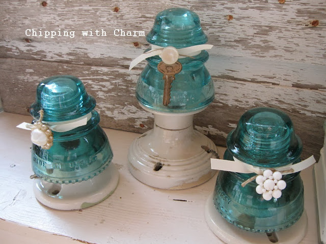 Chipping with Charm: Aqua Glass Insulator Trees...http://chippingwithcharm.blogspot.com/