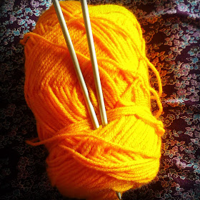 Wool and knitting needles