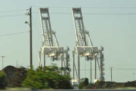 AtAts. Or cranes for moving shipping containers at the Port of Oakland.