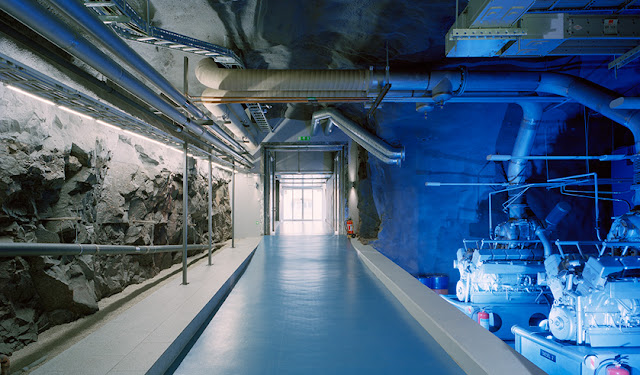 Photo of underground hallway with servers