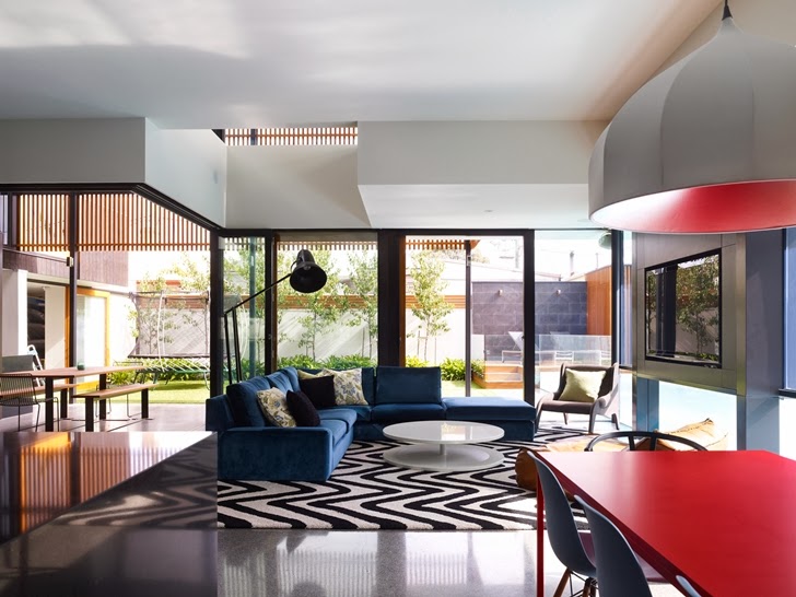 Living room in Dark Contemporary Home by Steve Domoney Architecture