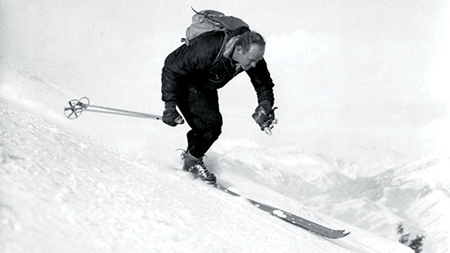 warren miller skiing down a mountain