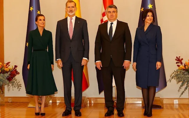 Queen Letizia wore a navy blue off-shoulders diamante midi dress by Bouret. First Lady Sanja Music Milanovic