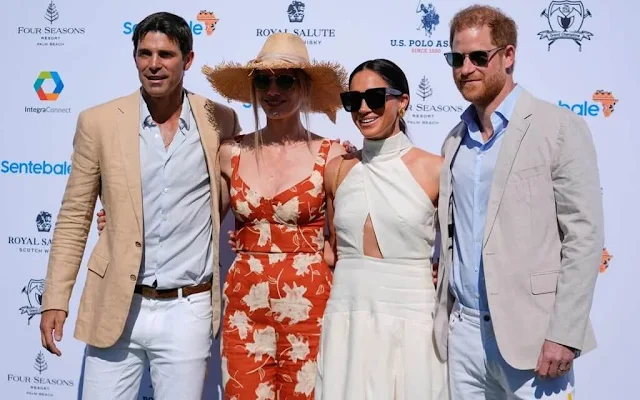 Meghan Markle, Duchess of Sussex wore an ivory silk ginger dress by Heidi Merrick at the Royal Salute Polo Challenge