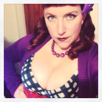 Plus Size Pin Up Redhead Sexy BBW in pigtails and low cut dress