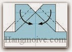 Bước 11: Gấp chéo hai cạnh giấy xuống dưới.