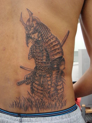 images from old woodblock-style paintings for their samurai tattoos.
