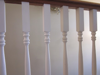 Townehouse interior painting - doors, railing and trim