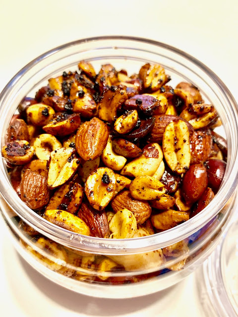 jar of roasted spiced nuts of all kinds