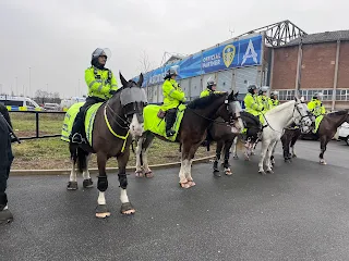 Police standing outside Elland Road