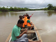 Focused while fishing for piranhas. I'm in the back of the boat near the .
