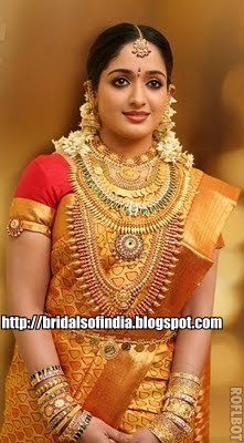 Kavya Madhavan wears traditional kerala jewellery on her wedding