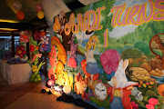 Alice and Wonderland backdrop with flower balloons