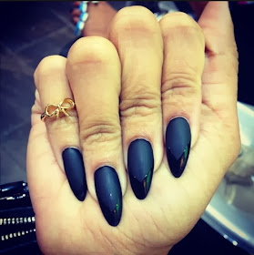 Beautiful pointy black nail art design