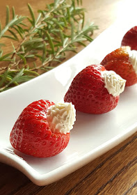 California strawberries filled with fresh goat cheese make a delicious low-carb appetizer