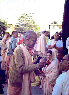 Srila Prabhupada Giving Out Flowers, Los Angeles