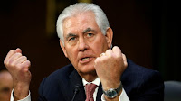 Rex Tillerson, the former chief executive of ExxonMobil, testifies Wednesday before the Senate Foreign Relations Committee. (Credit: Reuters/Kevin La