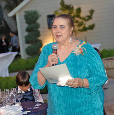 Mother of the groom reads her poem