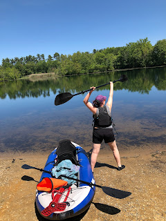 Picture of Dr. Haus heading out in her kayak