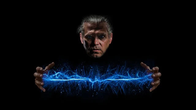 A midle age man generates miracle power by using his hands and mind.