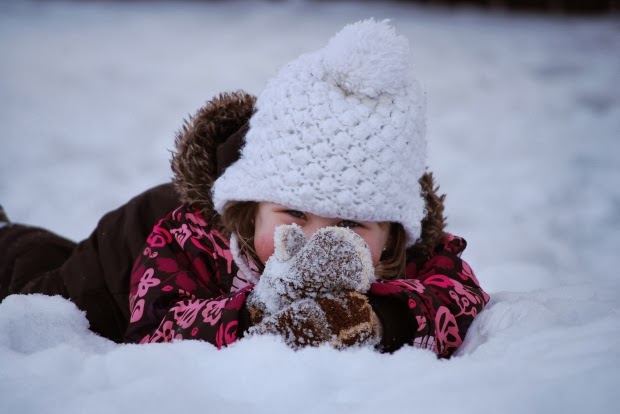 NAMC Montessori snow activities girl with mittens