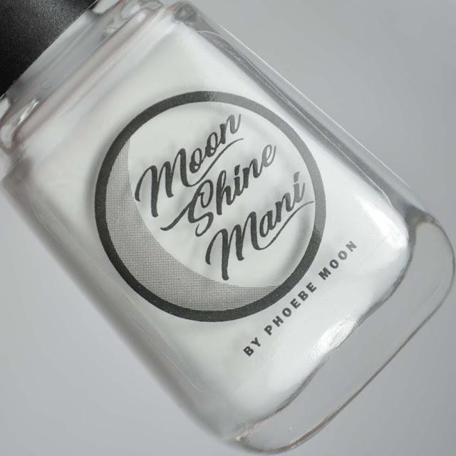 light grey nail polish in a bottle