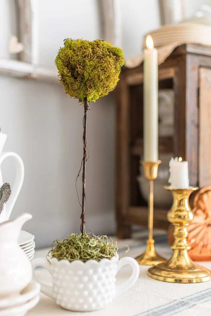 moss heart topiary, milk glass, candles