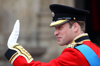 The Prince waves as he enters Westminster for the big day.