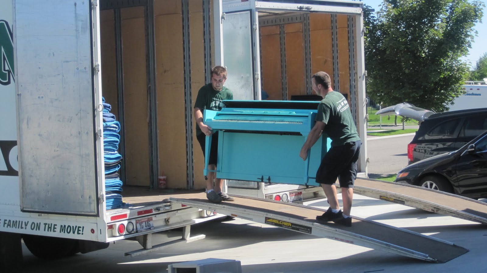 had to snap  picture of the piano being lifted into truck