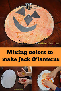 Halloween art activity for kids mixing colors to make Jack O'lanterns