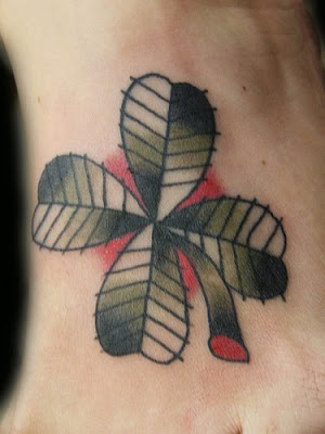 tattoos for girls on foot. clover tattoos for girls on