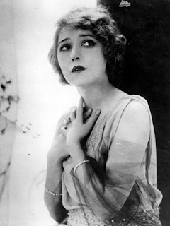 Vintage black and white photo of actress Mary Pickford.