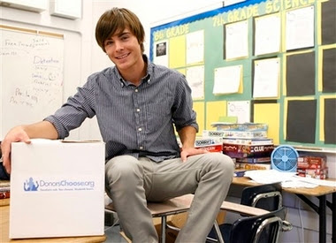 HSM darling Zac Efron greets his little fans at John Adams Middle School in L.A on Wednesday. Zac joined forces with DonorsChoose.org to announced the non-profit website is rolling out to schools nationwide to fulfill classroom needs and foster innovation.