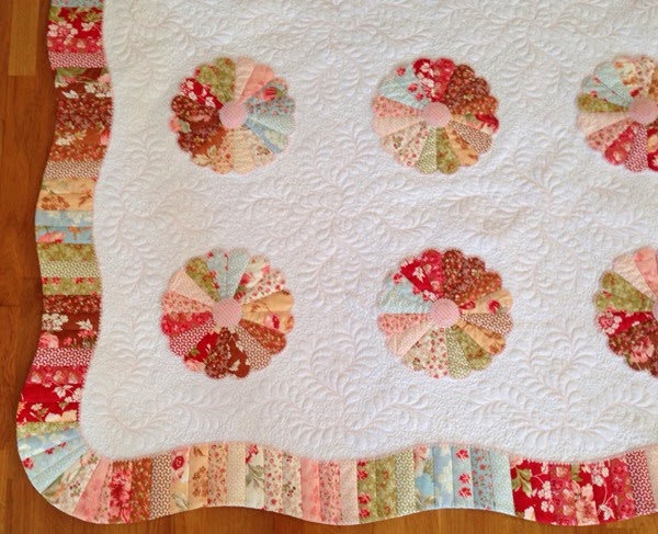 The feather motifs were originally digitized to this quilt.