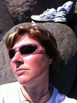 resting in the sun on the beach after my run