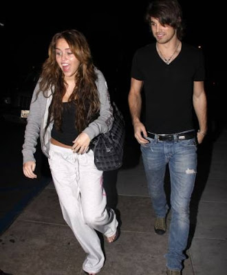 Miley Cyrus and Justin Gaston