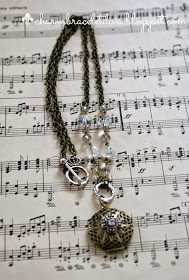 filigree antique brass locket with repurposed charm necklace