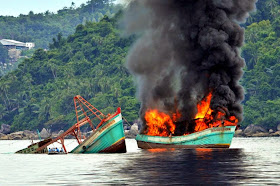 http://qz.com/346846/indonesia-is-sinking-illegal-fishing-boats-in-dramatic-fashion-and-may-be-killing-fish-in-the-process/