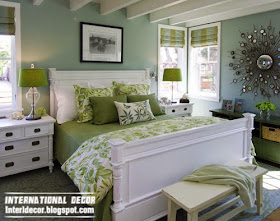 small bedroom in green paint color dark tones, classic bed white