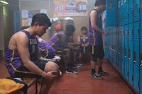 teen boys in a basketball locker room