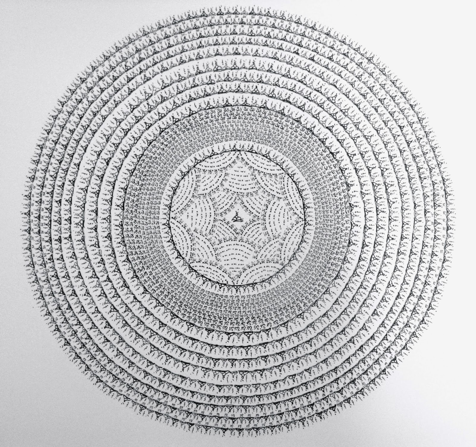 http://jqgaines.wordpress.com/category/likhita-japa-mandalas/