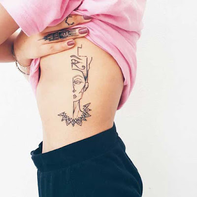 womens rib tattoo