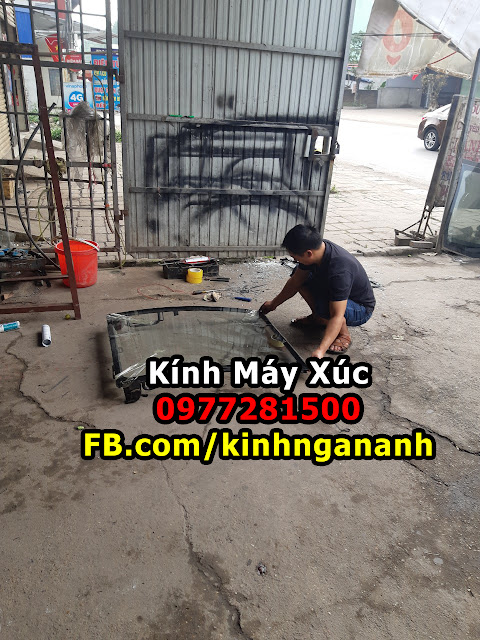 Tháo Lắp Kính Máy Xúc