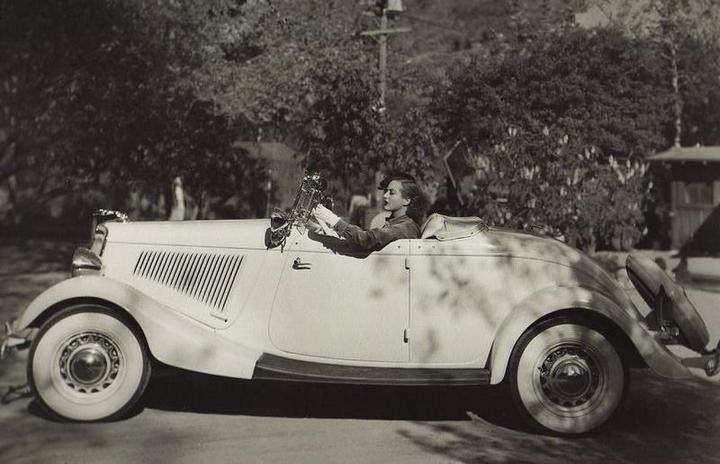 Robert Montgomery with his Cadillac Sport Phaeton