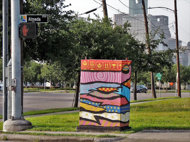 Beautified traffic control box on North-East corner with Downtown Houston Skyscrapers in the distance 