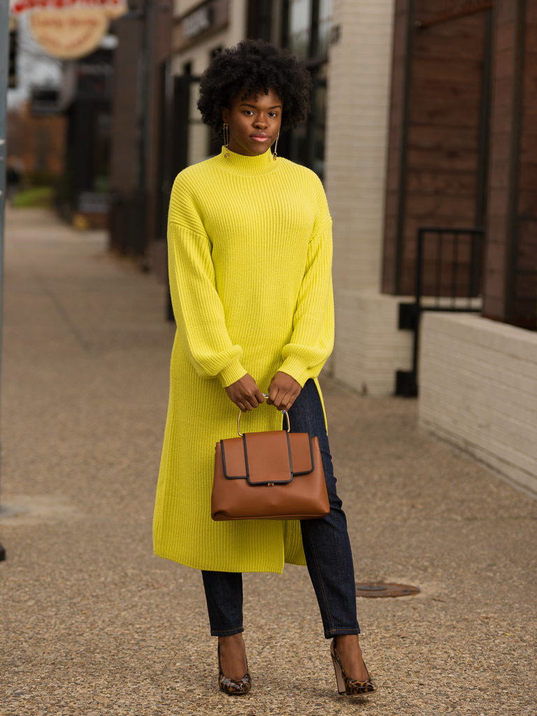 Blogger wearing knit dress and jeans ASOS