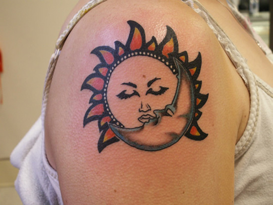 brightly coloured Sun and Moon tattoo The same design as in image above 