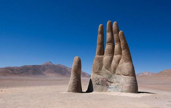 A photo of Mano del Desierto (Hand of the Desert)scuplture, in Atacama Desert, Chile